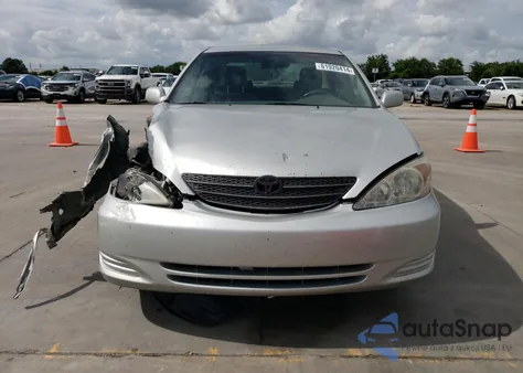 2003 Toyota Camry Le z USA, uszkodzony, nr VIN 4T1BE30K73U709871